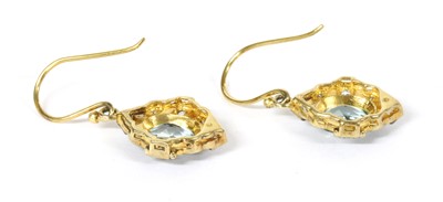 Lot 260 - A pair of silver and gold, blue topaz and diamond drop earrings