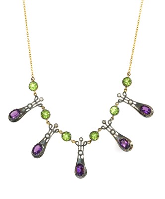 Lot 273 - A gold and silver, peridot, amethyst and diamond fringe necklace