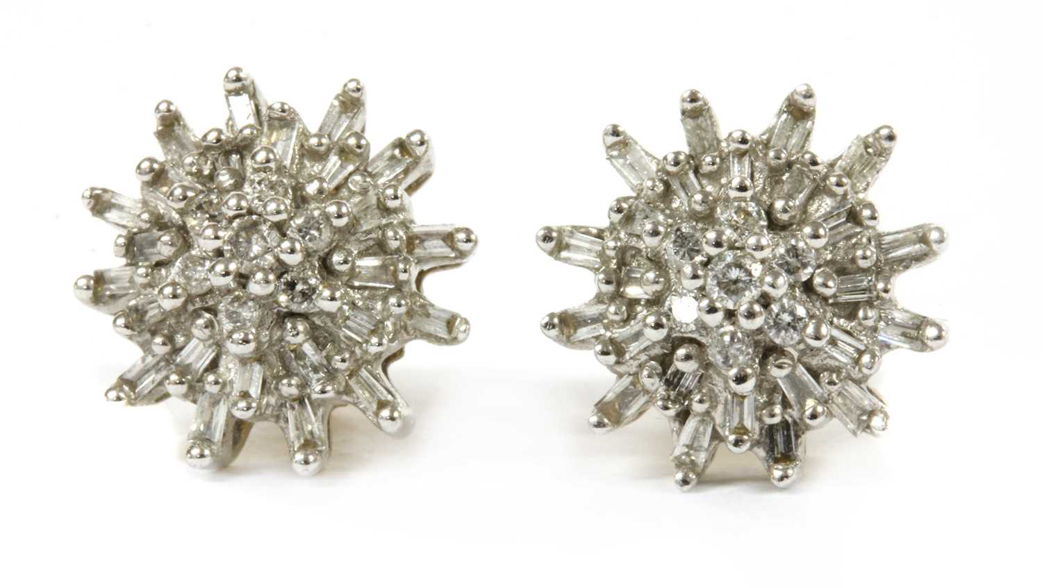 Lot 170 - A pair of 9ct gold diamond cluster earrings