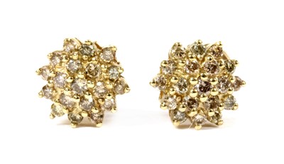 Lot 169 - A pair of gold diamond cluster earrings