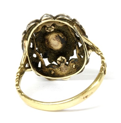 Lot 174 - A gold and silver diamond oval cluster ring