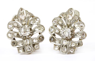 Lot 11 - A pair of Continental silver and gold diamond set earrings