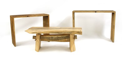 Lot 228 - A graduated pair of driftwood side tables