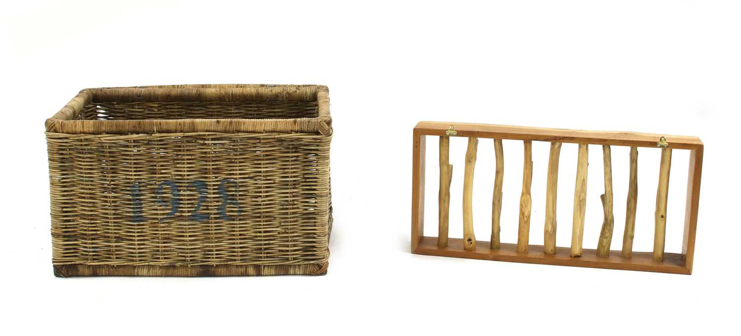 Lot 240 - A large wicker basket of rectangular form with hinged lid