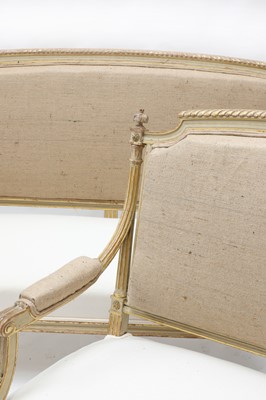 Lot 186 - A pair of French Louis XVI-style painted and parcel-gilt settees