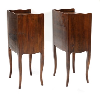 Lot 974 - A pair of French beech bedside tables