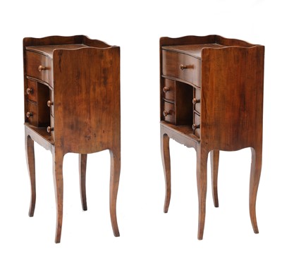 Lot 974 - A pair of French beech bedside tables