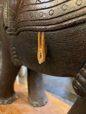 Lot 951 - An Indian sandalwood occasional table in the form of an elephant