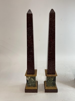 Lot 361 - A pair of porphyry obelisks