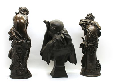 Lot 155 - Six modern resin statues and a mantel clock