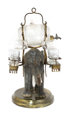 Lot 270 - A cold-painted elephant liqueur set
