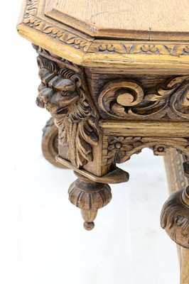 Lot 123 - A carved oak centre table