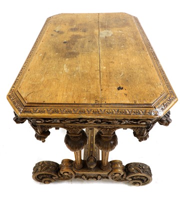 Lot 123 - A carved oak centre table