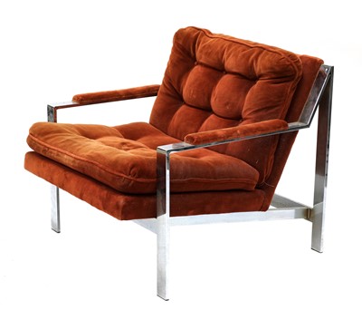 Lot 613 - A chrome and ginger upholstered armchair