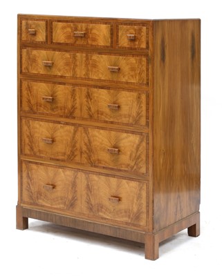 Lot 392 - A walnut crossbanded chest of drawers