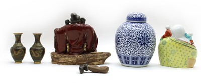 Lot 85 - A Chinese pottery deity
