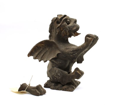 Lot 368 - A carved wooden and ebonised gryphon rampant