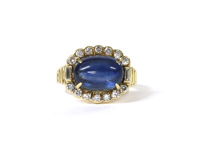 Lot 137 - A gold sapphire and diamond cluster ring