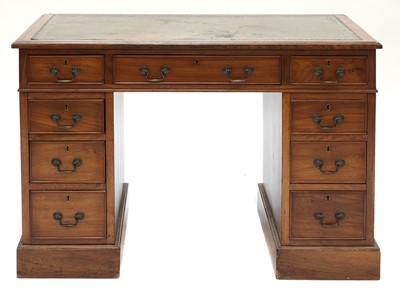 Lot 356 - A kneehole mahogany writing desk