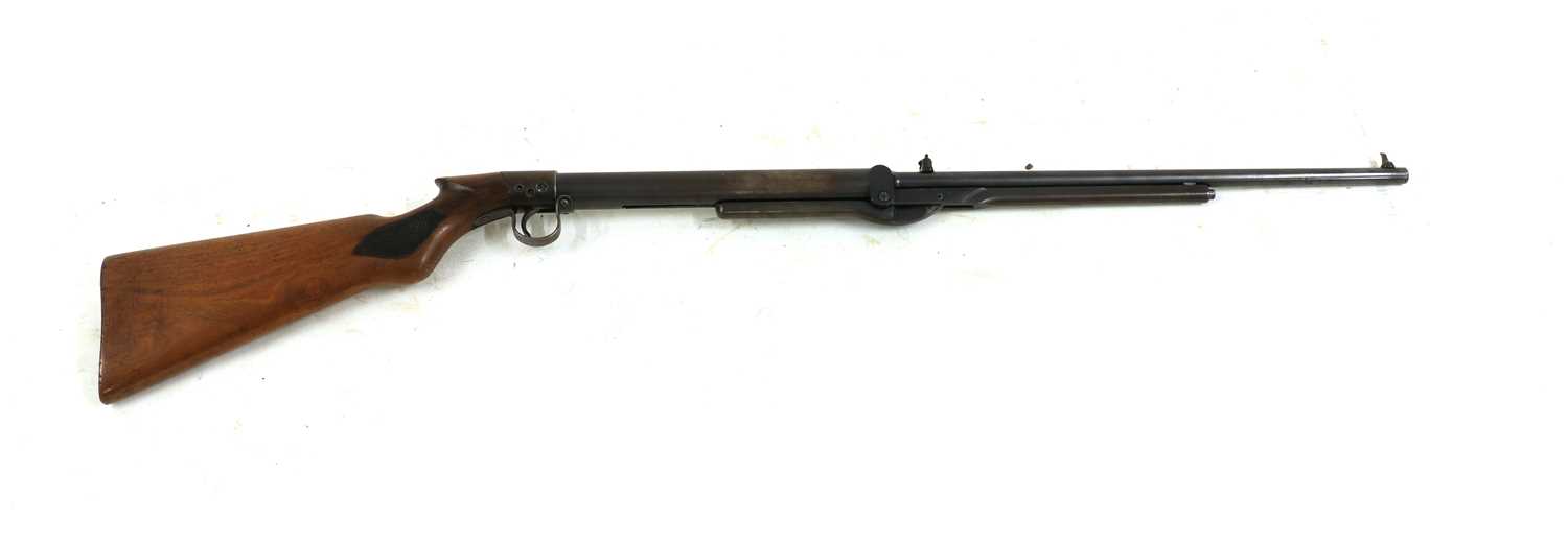 Lot 196 - An air rifle and a leather shot belt