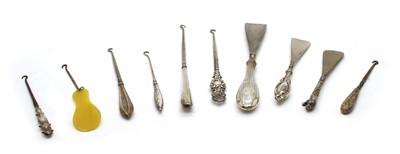 Lot 16 - Twenty six silver handled button hooks and shoe horns