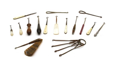 Lot 34 - Approximately  fifty shoe and glove button hooks