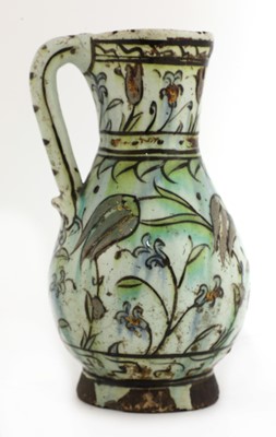 Lot 714 - An Ottoman Iznik pottery jug