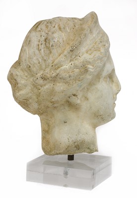 Lot 865 - A grand tour carved marble or limestone head of Diana