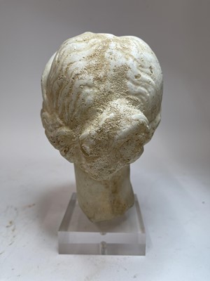 Lot 865 - A grand tour carved marble or limestone head of Diana