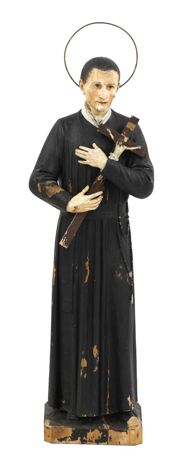Lot 142 - An Italian carved and painted pine figure of St Gerard Majella
