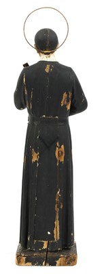 Lot 142 - An Italian carved and painted pine figure of St Gerard Majella