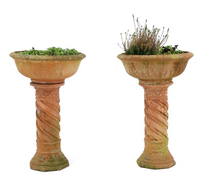 Lot 398 - A pair of terracotta garden urns