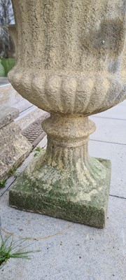 Lot 382 - A pair of composite stone campana garden urns