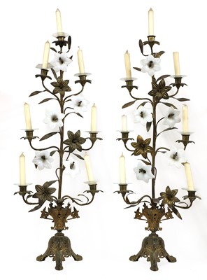 Lot 287 - A pair of opaline glass and gilt metal seven-light candelabra