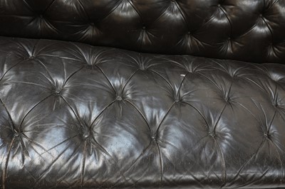 Lot 211 - A large buttoned leather chesterfield sofa