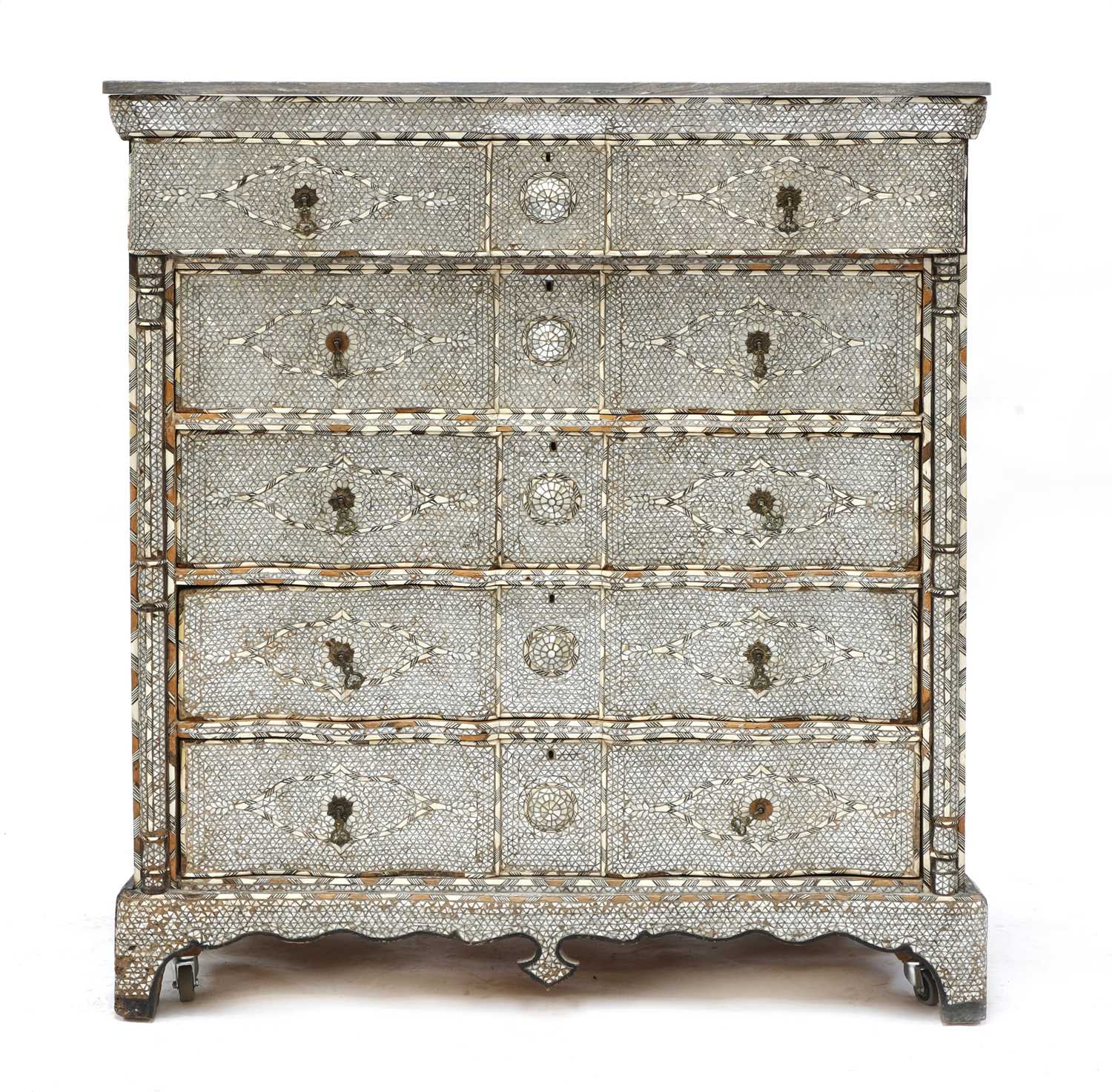 Lot 227 - A Syrian ebonised, mother-of-pearl and bone inlaid tall chest of drawers