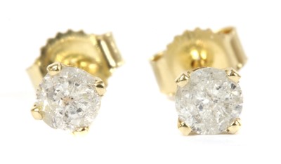 Lot 43 - A pair of gold single stone diamond stud earrings