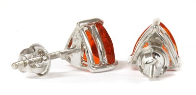 Lot 192 - A pair of white gold single stone fire opal stud earrings