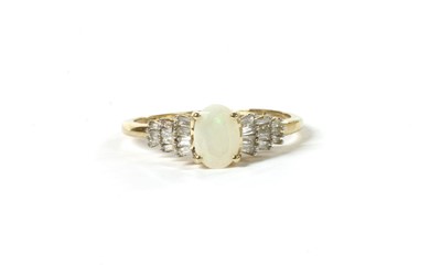 Lot 203 - A white gold opal and diamond ring