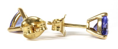 Lot 177 - A pair of gold single stone tanzanite stud earrings