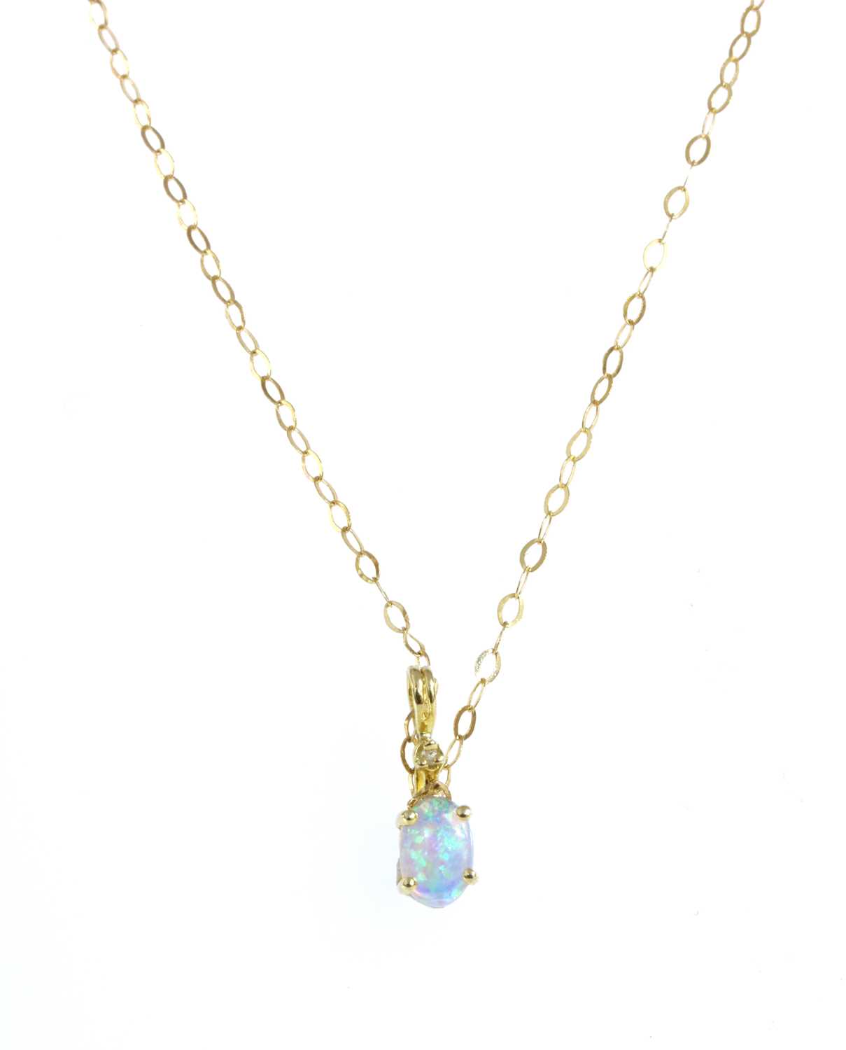 Lot 201 - A gold synthetic opal and diamond pendant
