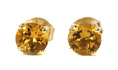 Lot 198 - A pair of gold single stone citrine stud earrings
