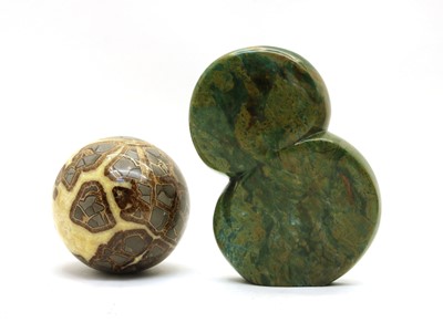 Lot 39 - A decorative stone orb and an African greenstone sculpture