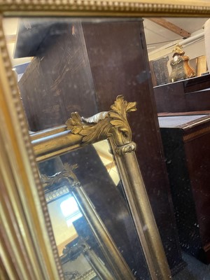 Lot 781 - A pair of Regency-style giltwood pier mirrors