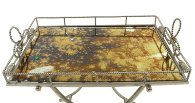 Lot 268 - A modern mirrored tray on stand