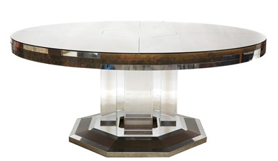 Lot 759 - A massive circular glass-panelled dining table