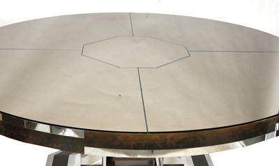Lot 759 - A massive circular glass-panelled dining table