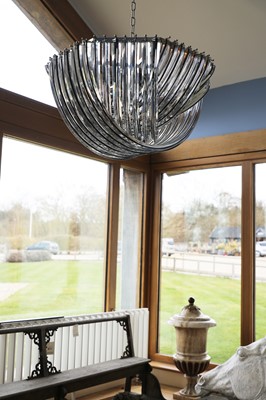 Lot 573 - A contemporary glass hoop chandelier