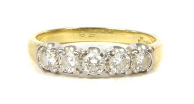 Lot 50 - An 18ct gold five stone diamond ring