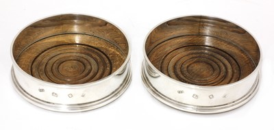 Lot 806 - A pair of modern wine coasters